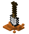 Shovel buried in red sand
